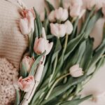 a basket filled with lots of pink flowers